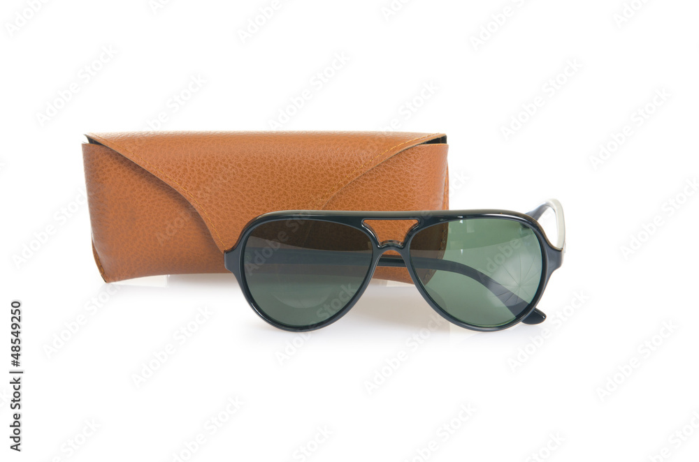 Elegant sunglasses isolated on the white Elegant sunglasses isolated on the white