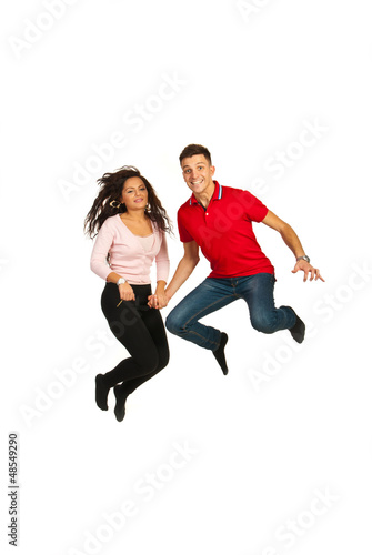 Happy couple jumping