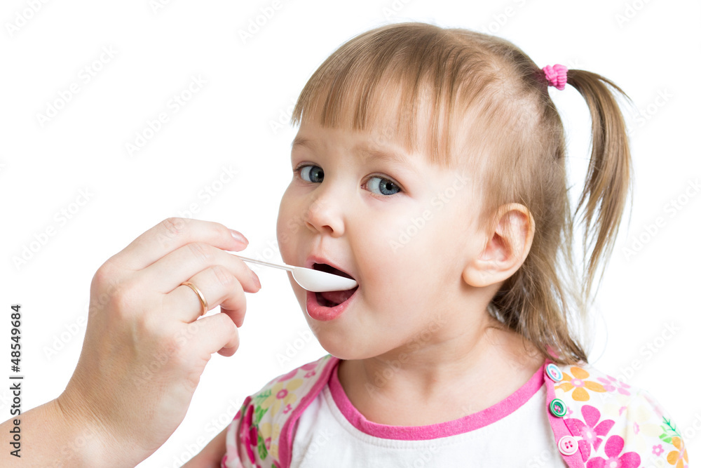 doctor giving drug to child girl isolated on white doctor giving drug to child girl isolated on white