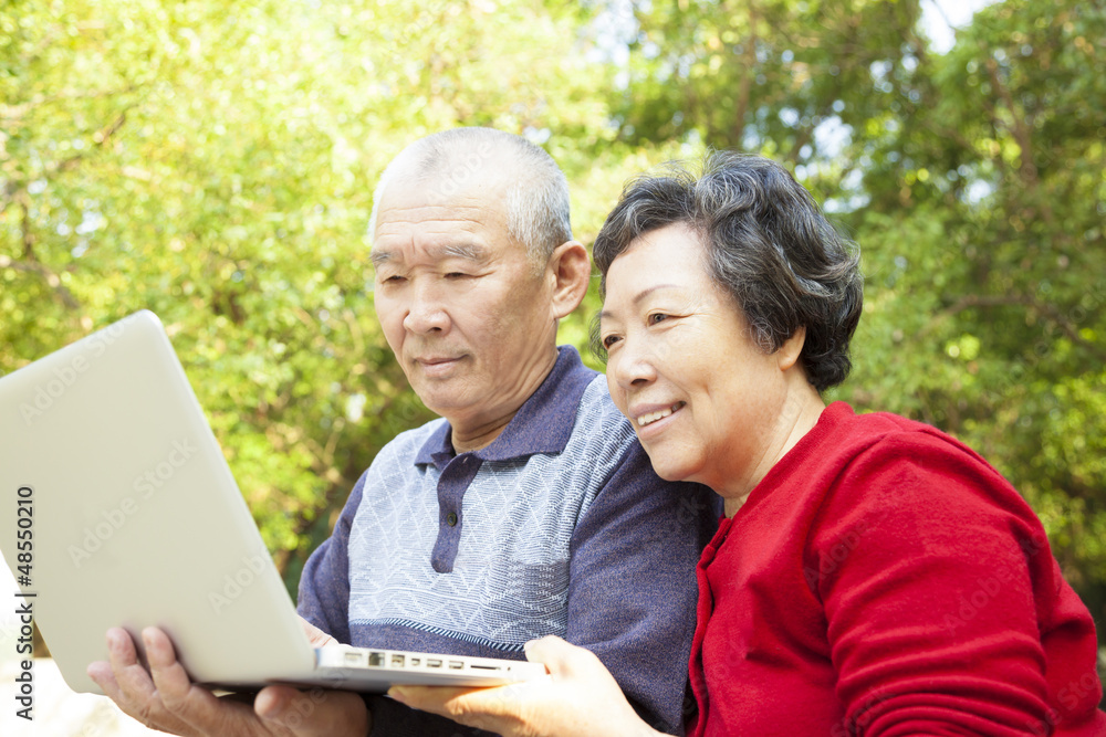 happy Senior couple learning with laptop happy Senior couple learning with laptop