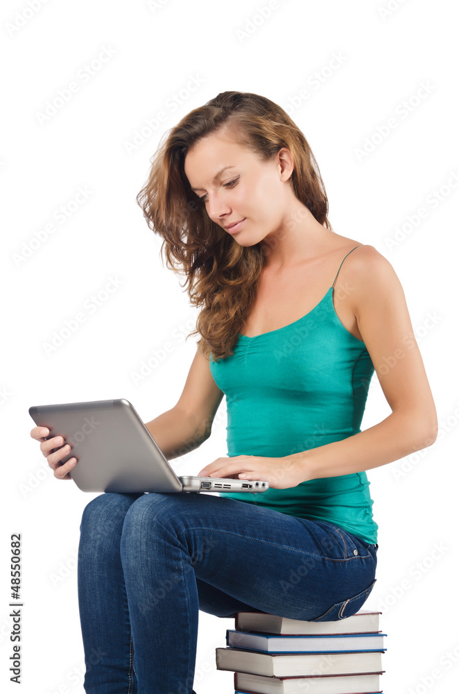 Fototapeta premium Student with netbook sitting on books