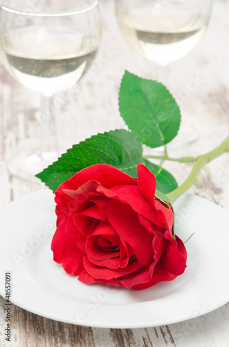 Rose and glasses of wine on Valentine's Day