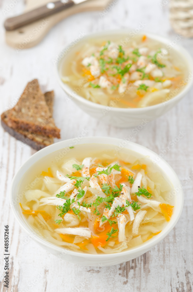 vegetable soup with chicken, cabbage and parsley
