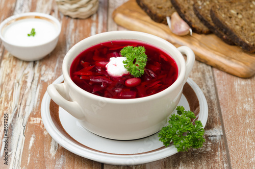 Ukrainian and russian national red borsch with sour cream