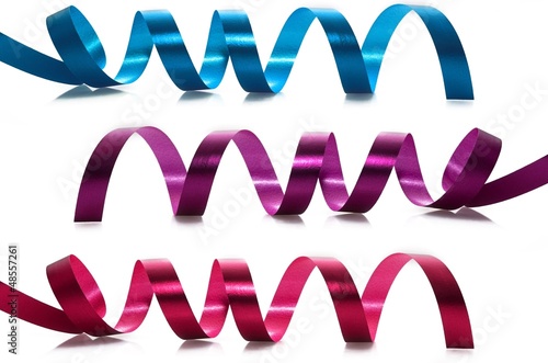 Red ,purple and blue ribbons on white background.