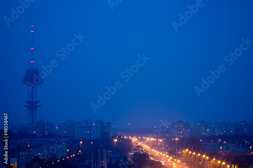 beautiful light trail on the road tower, blue hour in village