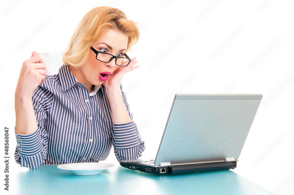 Funny surprised business woman watching in laptop, isolated Funny surprised business woman watching in laptop, isolated