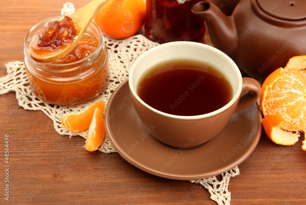 light breakfast with tea and homemade jam, on wooden table light breakfast with tea and homemade jam, on wooden table