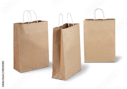 Three brown paper bags