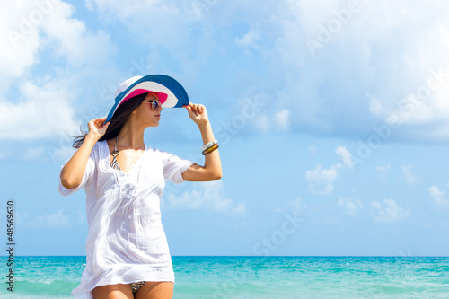 Young woman relaxing on the beach photo