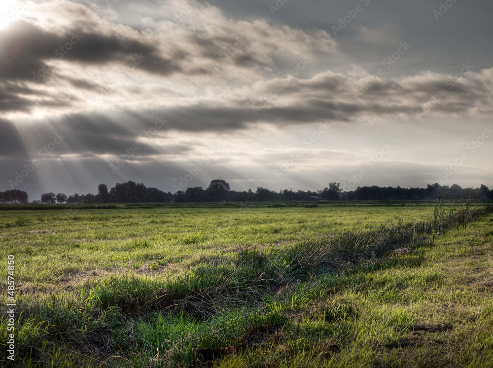 Trench in agricultrural grass field