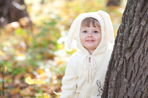 Wallpaper Mural beautiful little girl in costume bunny in the autumn forest Torontodigital.ca