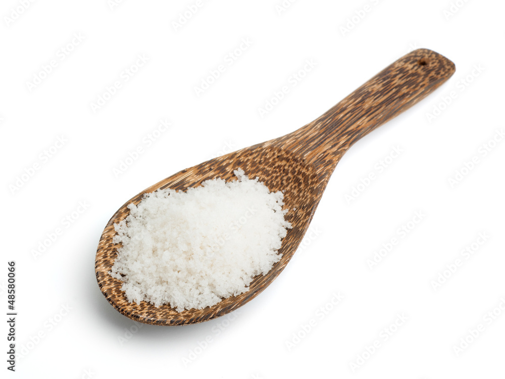 Salt in a wooden spoon Salt in a wooden spoon