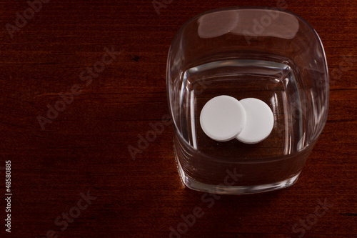 pills in a glass photo