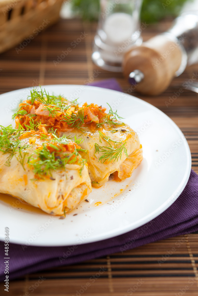 cabbage rolls with rice and mushrooms on a plate cabbage rolls with rice and mushrooms on a plate