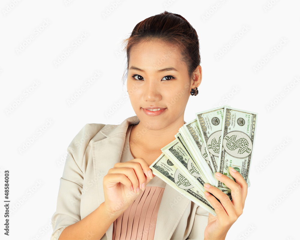 Isolated young business woman with U.S. dollar bank notes Isolated young business woman with U.S. dollar bank notes