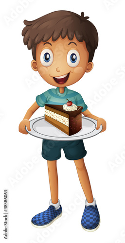 A smiling boy with cake