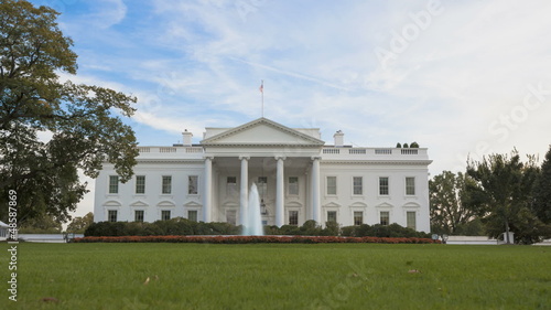 Time lapse of the White House with a blue sky