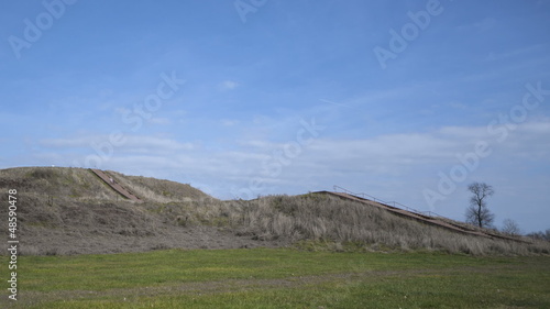 People walking up the prehistoric Monks Mound of Cahokia