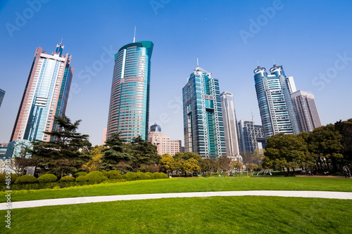 city park with modern building background in shanghai © 06photo