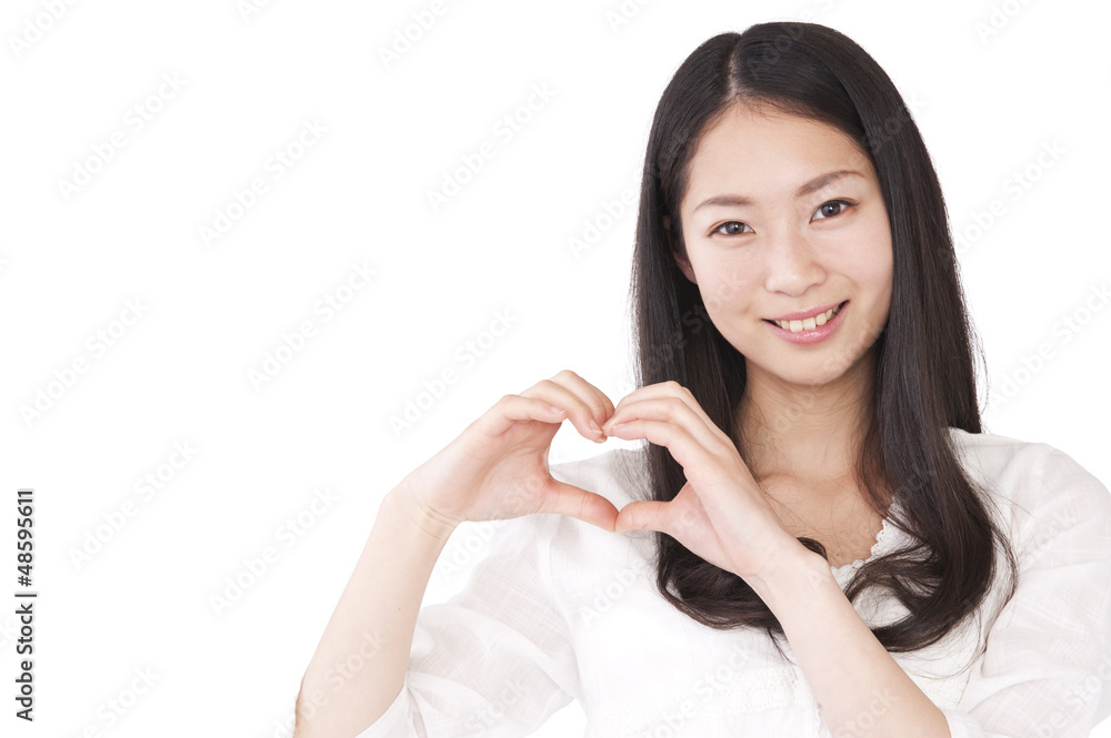 手でハートマークをつくる女性 Stock Photo Adobe Stock 手でハートマークをつくる女性 Stock Photo Adobe Stock