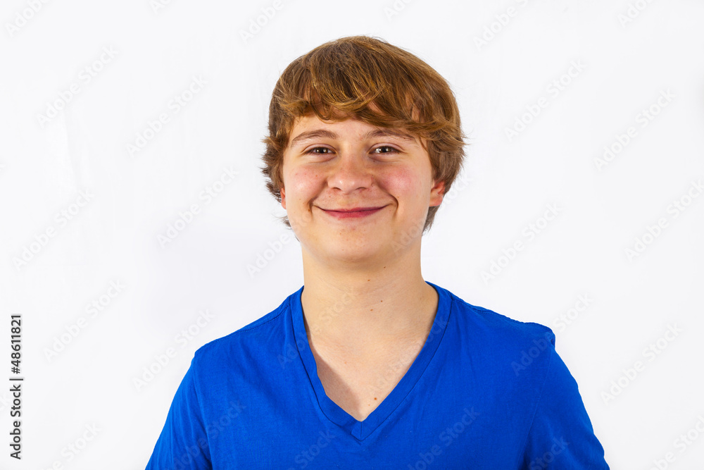 A smiling boy is showing his thumb up; isolated on the white bac A smiling boy is showing his thumb up; isolated on the white bac