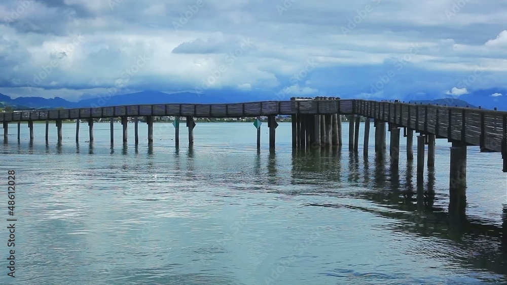 Wooden bridge over lake. Wooden bridge over lake.