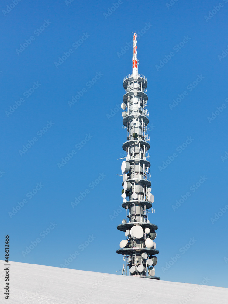 Communications Tower on a Snowy Mountain Peak