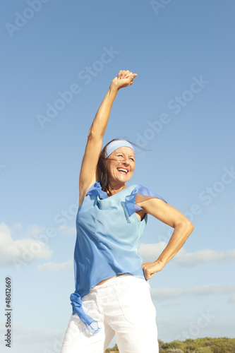 Successful happy mature woman outdoor © roboriginal