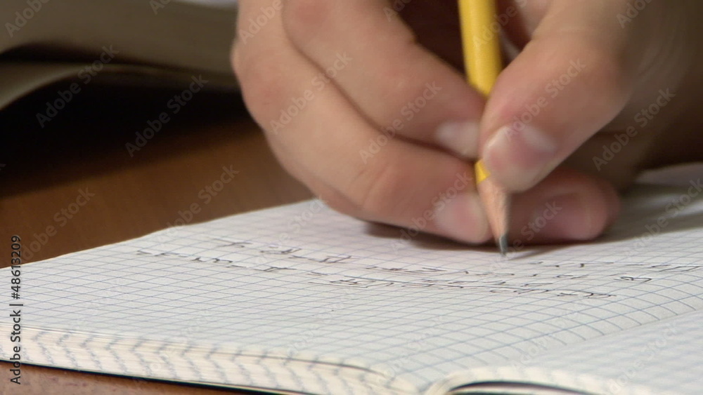 School Teen writing mathematic formulas School Teen writing mathematic formulas