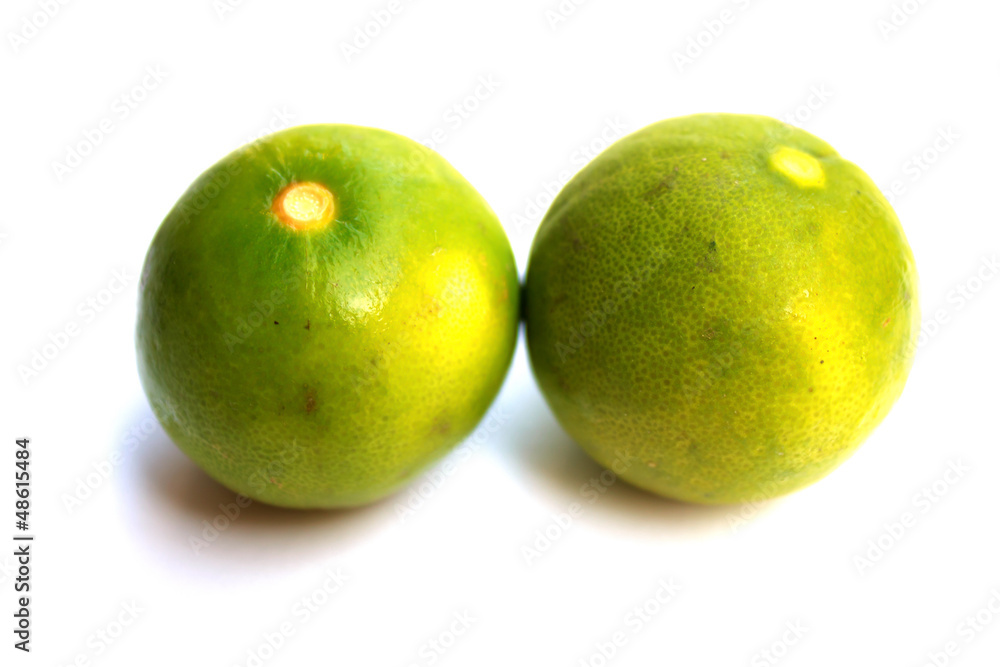 Fresh ripe lime. Isolated on white background Fresh ripe lime. Isolated on white background