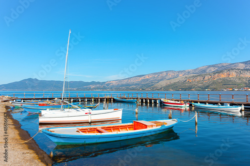 Greece Aitoliko, traditional fishing boats port in sea lake in C photo