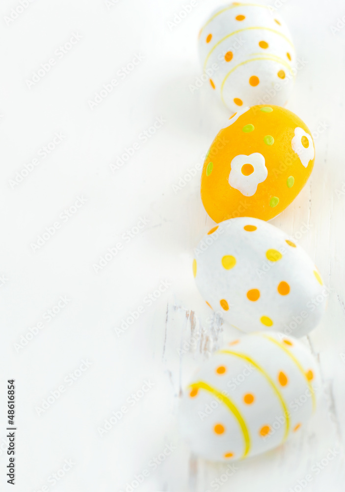 Small yellow painted easter eggs