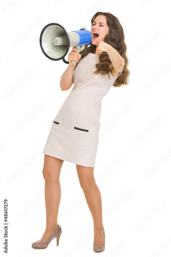 Full length portrait of young woman shouting in megaphone Full length portrait of young woman shouting in megaphone