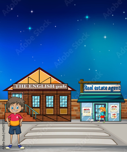 A boy standing in the street