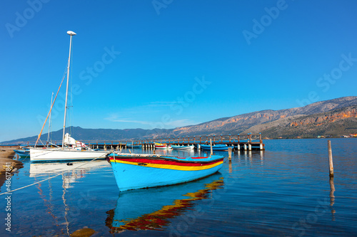 Greece sea lake in Aitoliko, Traditional fishing boat, Central G photo