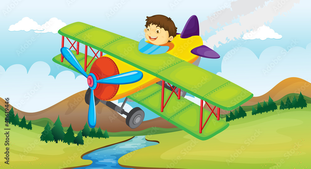 A boy and a flying airplane