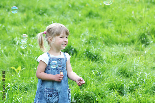 little girl with bubbles