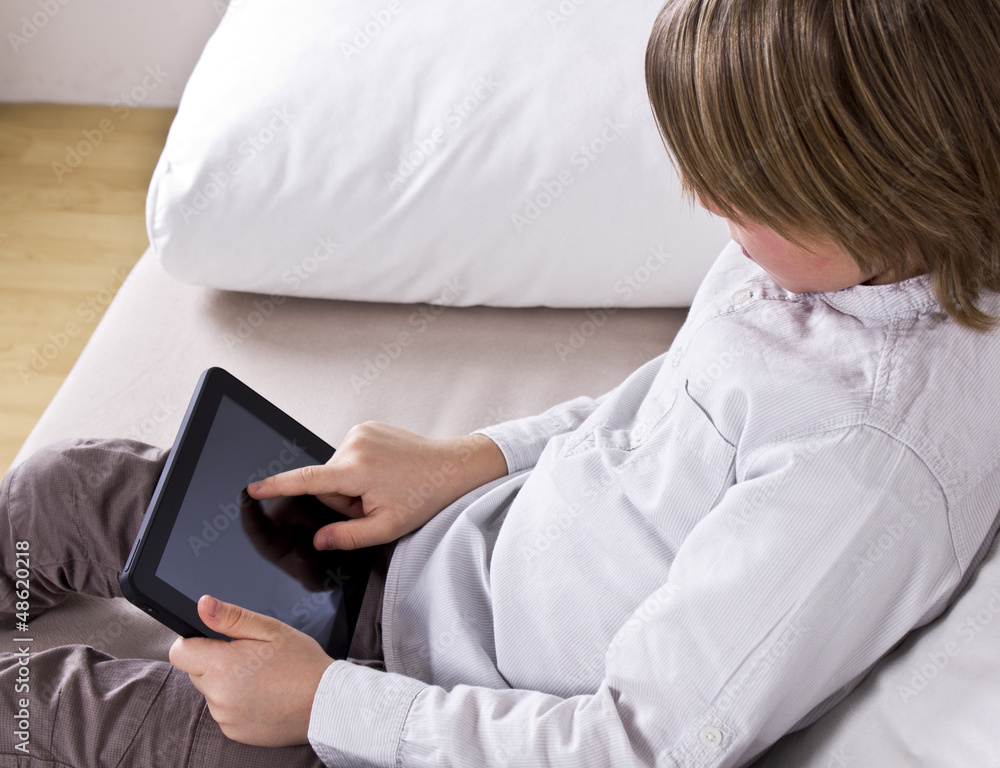 Kid holding digital tablet Kid holding digital tablet