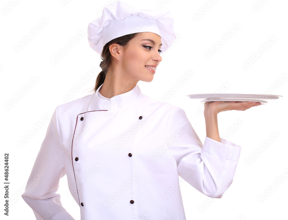 Portrait of young woman chef with tray isolated on white Portrait of young woman chef with tray isolated on white