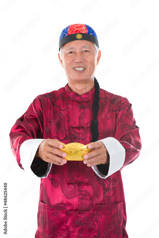 senior chinese man with gold bullion and traditional chinese clo