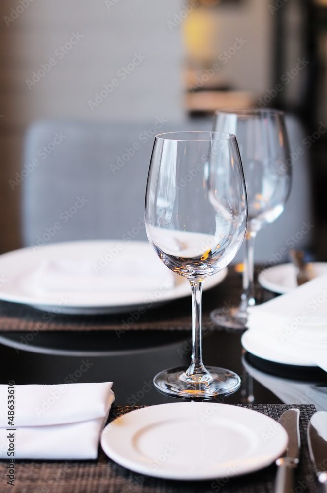 Two wine glasses on a table
