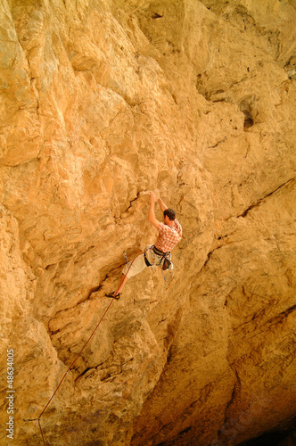 Freeclimber in einer Steilwand 2 photo