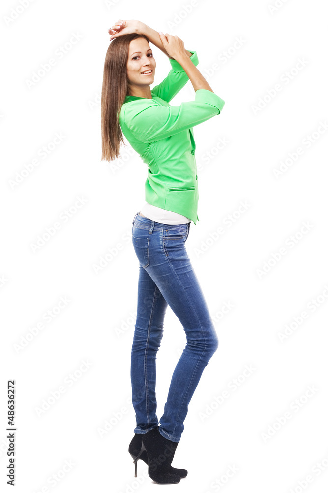 Beautiful woman in green jacket and blue denims Beautiful woman in green jacket and blue denims