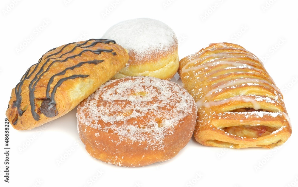 A selection of cakes on a white background