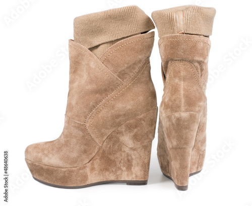 Pair suede boots with integral legging