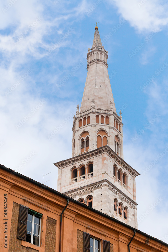 bell tower of Modena Cathedral under urban houses bell tower of Modena Cathedral under urban houses