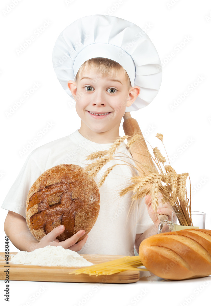 baker boy with a loaf of rye bread and rolling pin baker boy with a loaf of rye bread and rolling pin