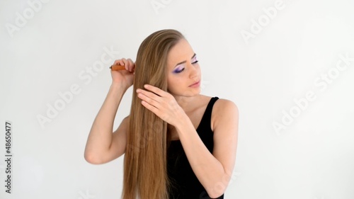 girl combing of her hair