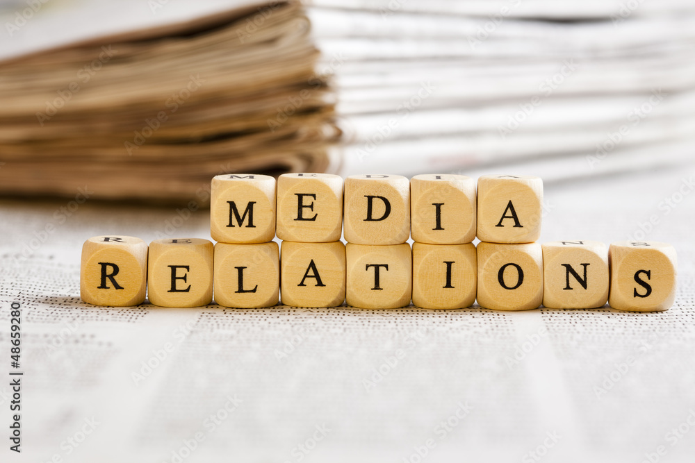 Letter Dices Concept: Media Relations